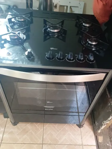 Vendo fogão usado mesa e frente de vidro 