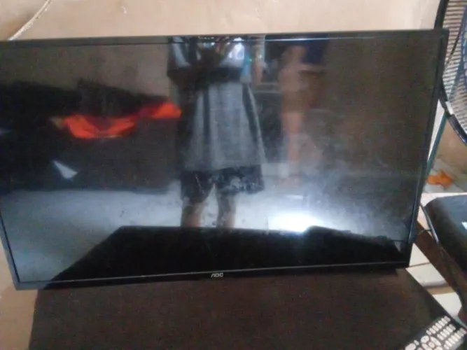 televisão AOC SMART 32 polegadas, pouco tempo de uso. perto da maternidade garavelo