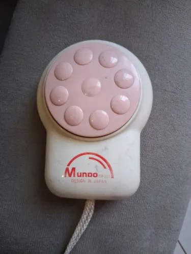 Massageador a pilha usado
