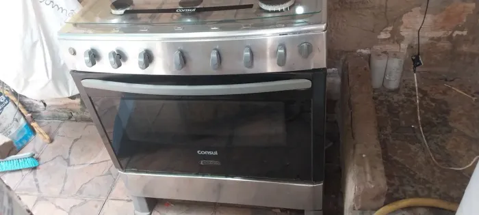 Fogão de inox com defeito