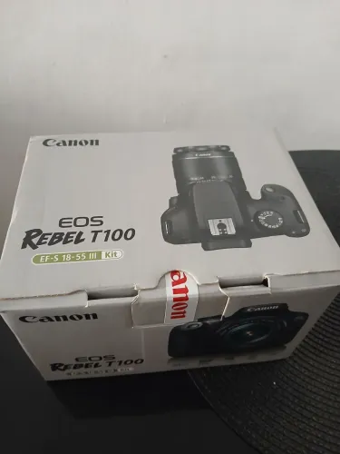 Canon rebel eos T100 + lente 18-55mm