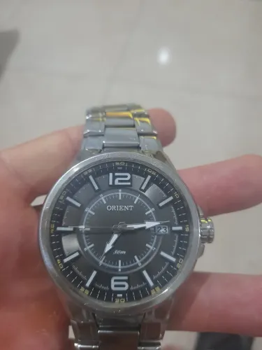 Vendo um relógio orient funcionando perfeitamente 