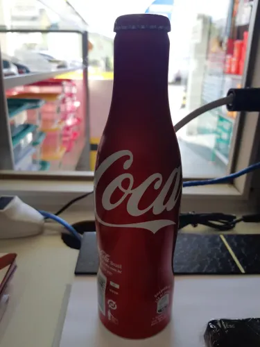 Garrafinha de Coca Cola Coleção 250ml "Ler a Descrição".<br><br><br><br>