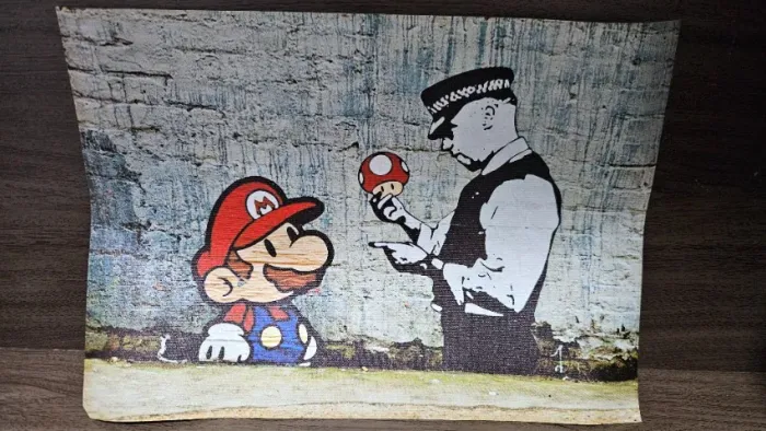 Obra de Banksy em canvas