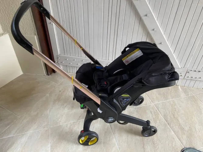 Bebê conforto que vira carrinho Noel Naty