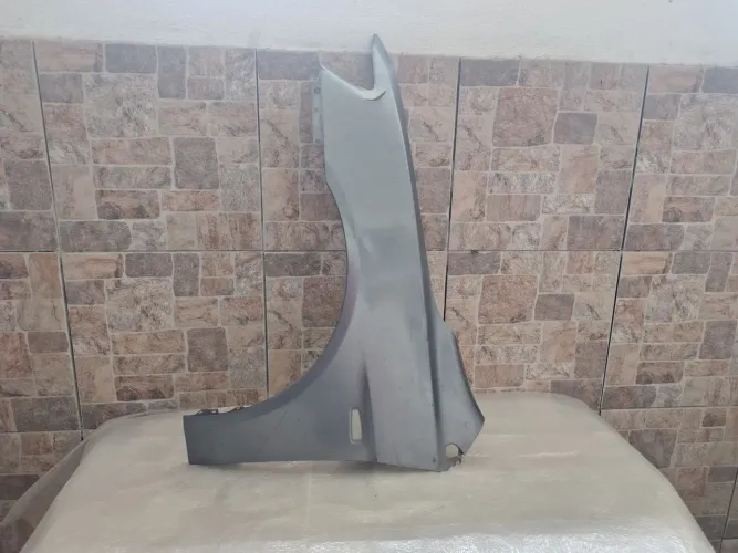 Paralama dianteiro esquerdo Mitsubishi Lancer 2008 a 2015 original c detalhe