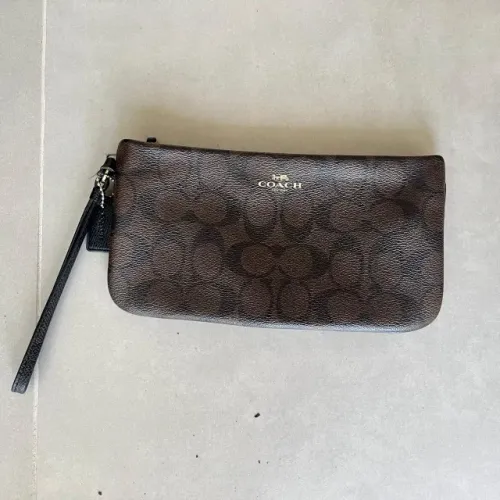 Bolsa de mao wrislet coach monograma preta e marrom
