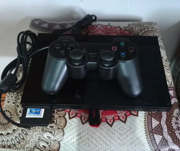 PS2 Slim com muitos jogos