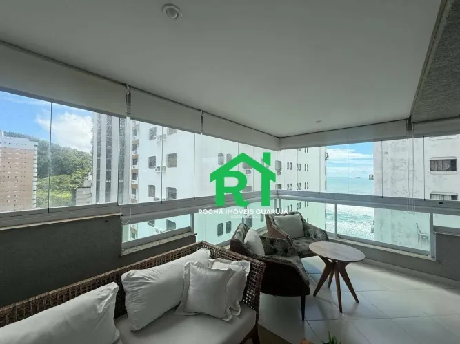 Apartamento à beira-mar com 3 suítes, varanda gourmet e lazer  Praia das Astúrias, Guarujá