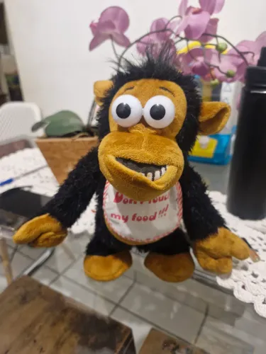 Macaco de pelúcia eletrônico