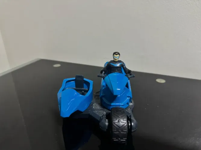 Brinquedo imaginext transformável asa noturna