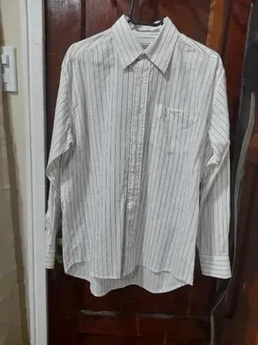 Camisa social companhia do terno.