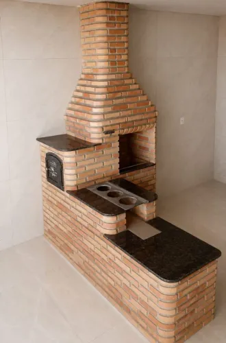 Fogão de lenha e churrasqueira de tijolinho