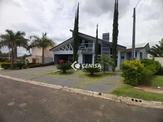 Casa com 4 suítes, 292 m² - venda por R$ 2.800.000 ou aluguel por R$ 16.830/mês - Condomín