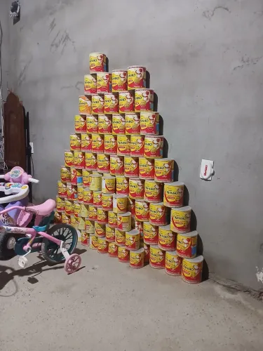 Vendo latas de leite vazia