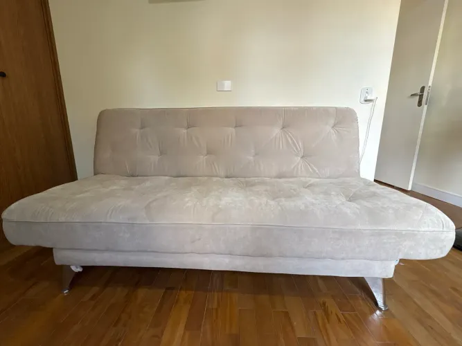 Sofá-cama estofado bege