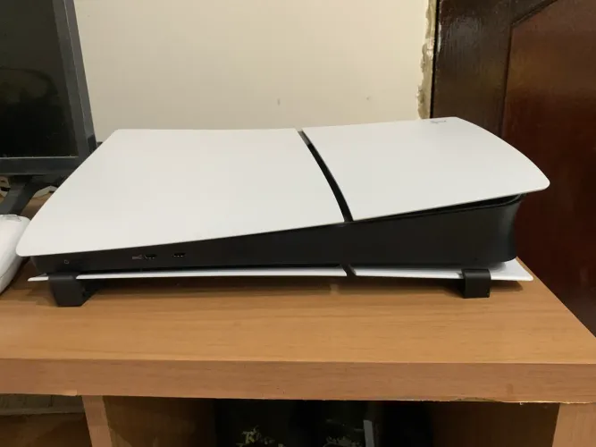 Vendo/Troco PS5 Slim 825gb Novo com caixa + Base de carregamento Sony