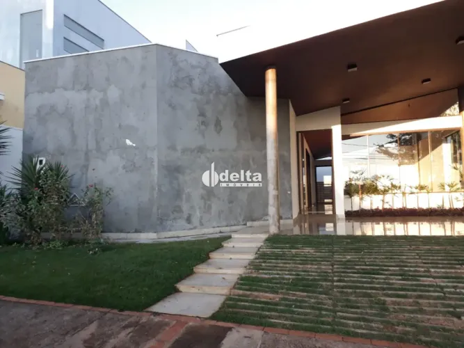Casa com 4 quarto sendo suíte disponível para venda no bairro Bosque dos Buritis em Uberlâ