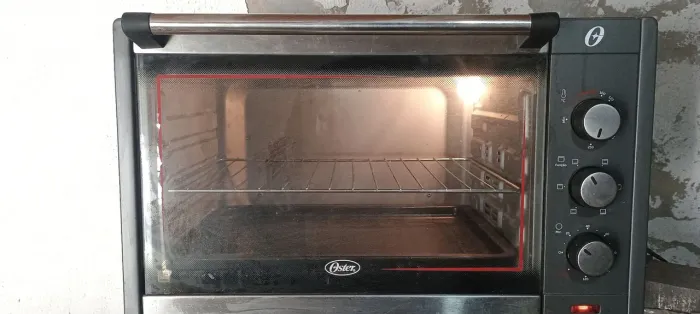 Forno elétrico Oster 45 litros 110 volts com turbina para assar
