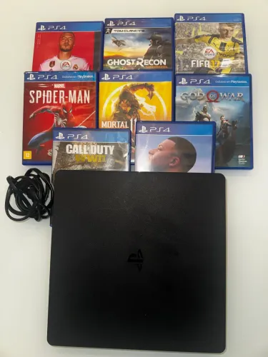Vendo PS4 Slim em ótimo estado com jogos