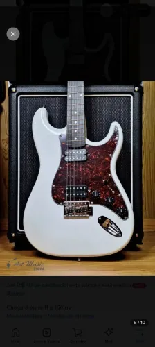 Troco guitarra Giannini + pedal de efeito por baixo.