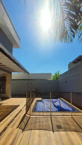 Casa moderna para locação em condomínio fechado 3 suítes com closet, piscina e gourmet Rib