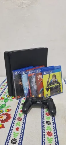 Ps4 slim (1 TB) + 5 jogos