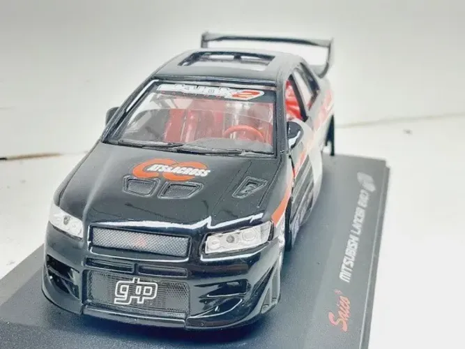 Miniatura Mitsubishi Lancer Evo.7 Saico 1/32 Preto
