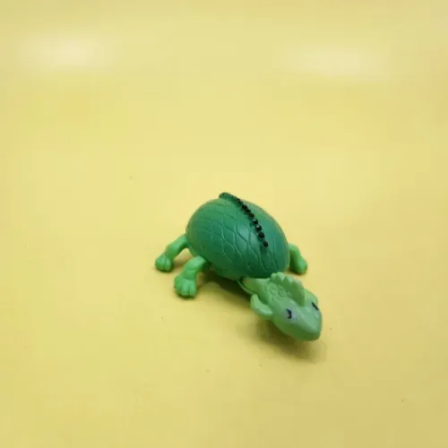 KINDER OVO - Lagarto da coleção animais sobre rodas