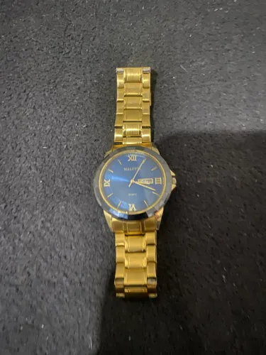 Vendo relógio malotty original funcionando