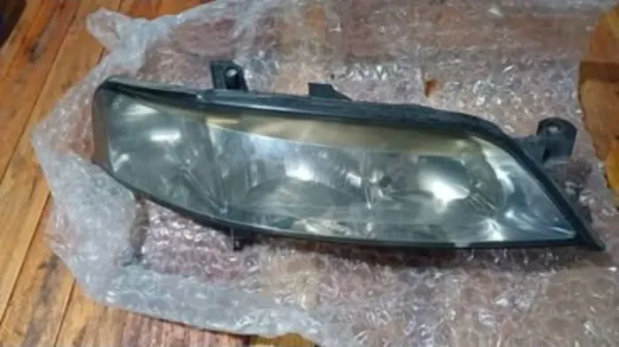 Farol direito original GM Vectra 05