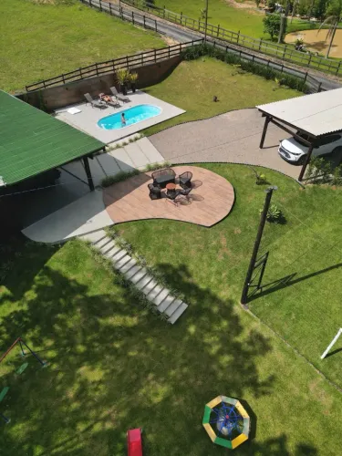 Sítio com casa semi mobiliada com piscina
