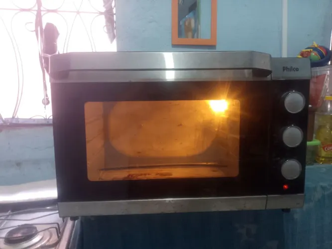Forno elétrico 50L segunda mão funcionando perfeitamente  só está sem a grade