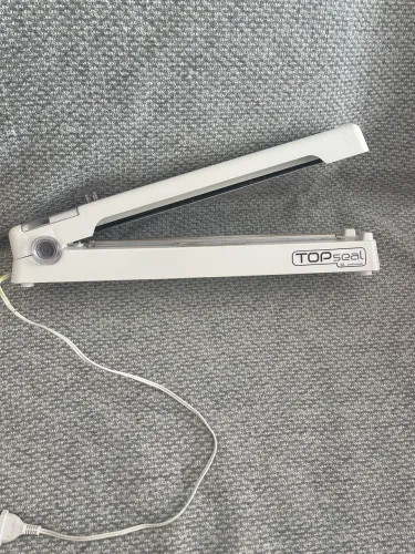 Seladora Topseal usada