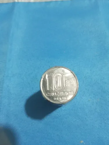 27 moedas antigas de 10 cruzeiros dos anos 90.