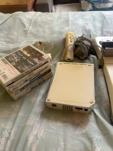 Nintendo Wii completo com 10 jogos , 1 controle e Wii board de brinde