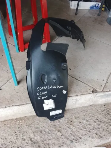 Para Barro dianteiro esquerdo Chevrolet Corsa Montana 2002 / 2009