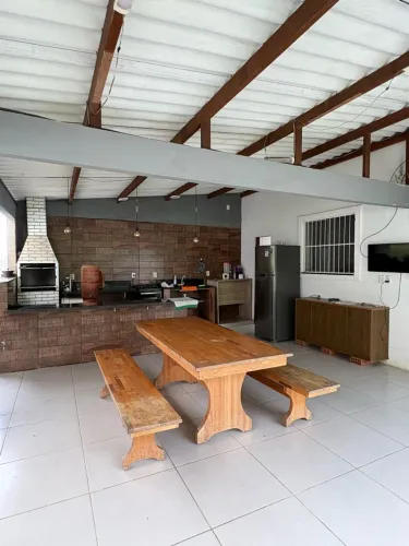 Casa com piscina em Praia Grande