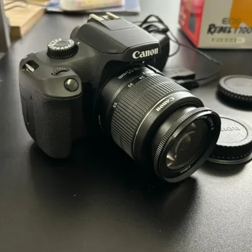 Câmera completa eos rebel t100 + lente ef-s 18-55mm f3.5-5.6 iii