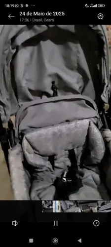 Carrinho com bebê conforto 