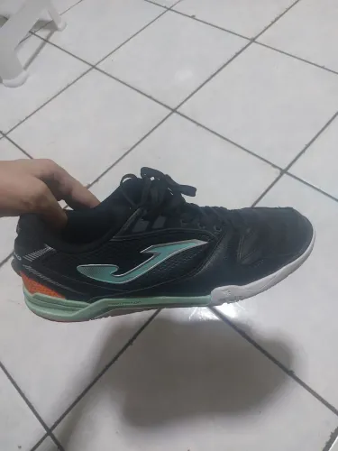 Chuteira joma dribling usando só parte de baixo em cima as perfeito