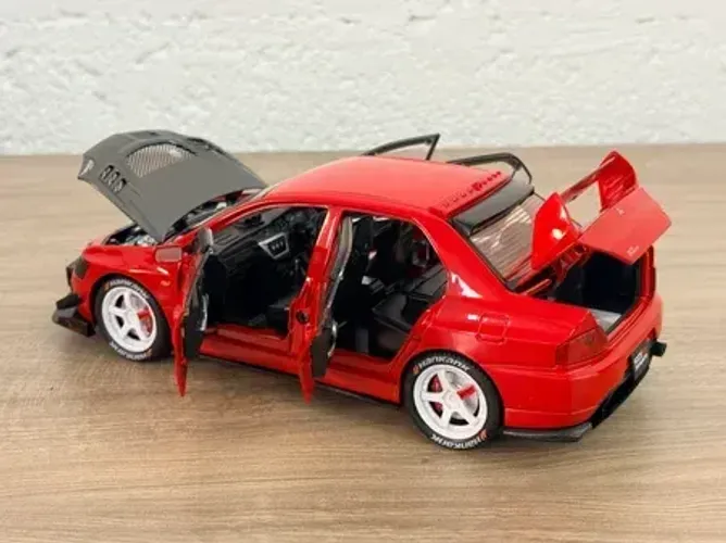Lancer Evolution IX vermelho - som e luz - 1:24 