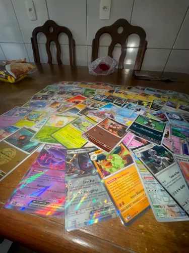 100 cartas Pokémon novinhas