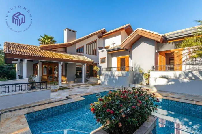 Casa com 4 dormitórios à venda, 663 m² por R$ 3.500.000,00 - Condomínio Residencial Isaura