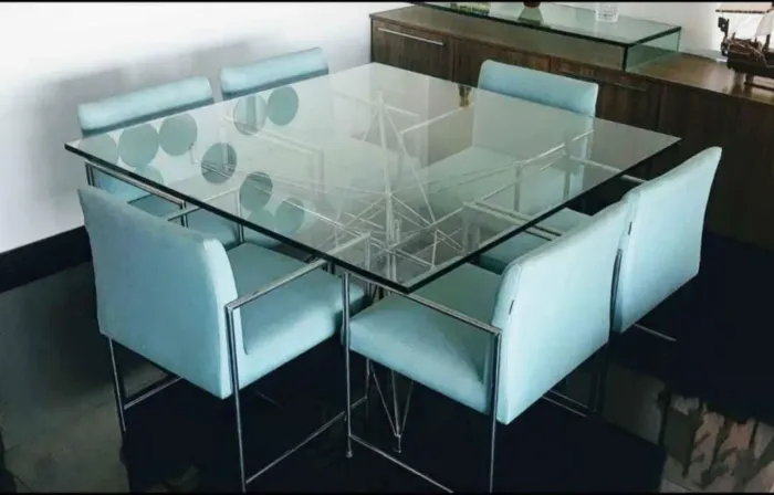 Mesa vidro 20mm com base inox estrela e 6 cadeiras acochoadas base inox.