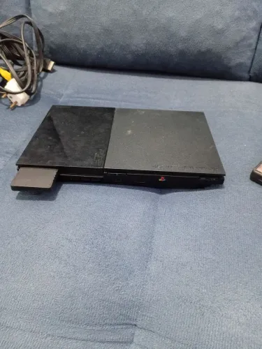 PlayStation 2 um controle e um memória card