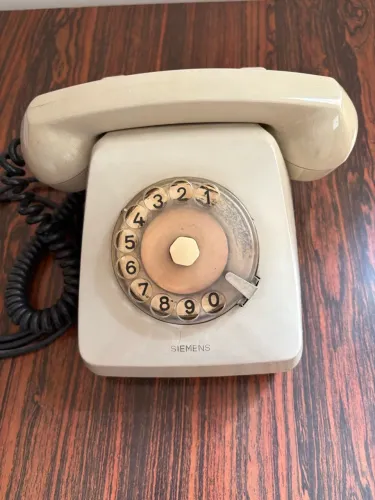 Telefone antigo de disco Siemens