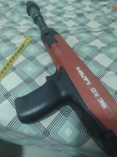 Pistola fica pino Hilt DX calibre 22/27 para gesso 