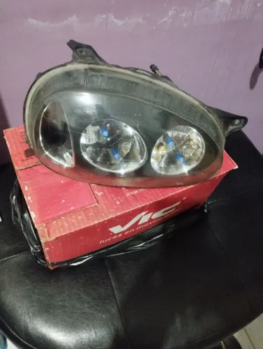 Farol do corsa . 96