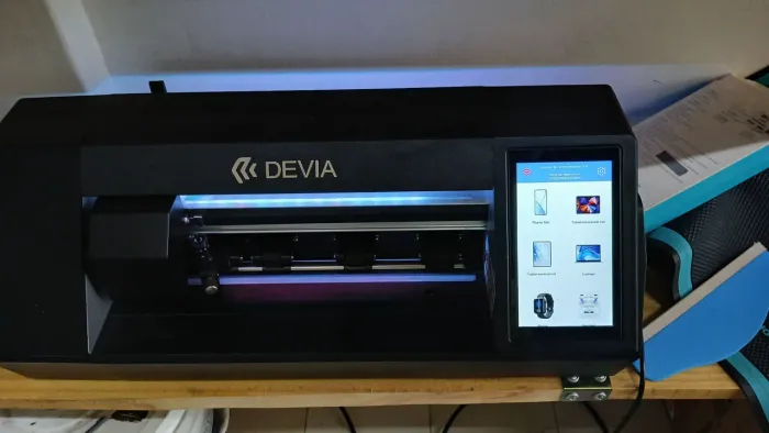 Maquina de corte de película para aparelhos